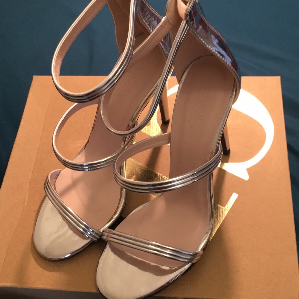 Brand new silver heel